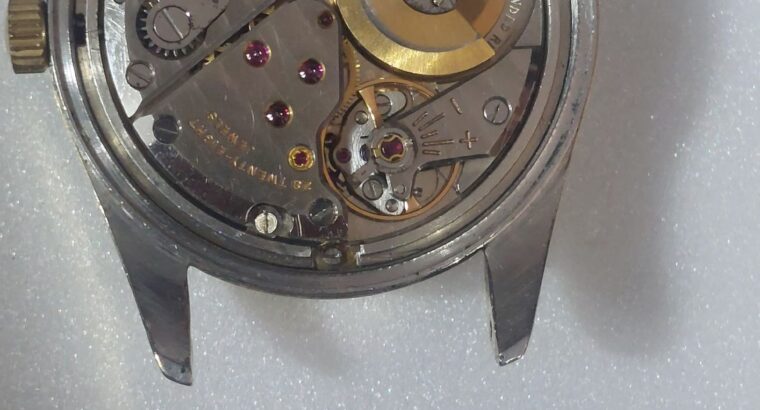 Relógio marca universal gêneve modelo polerouter aço e ouro